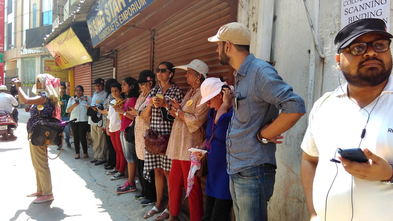 Listening to tales from the past as we soak in the current atmosphere, off Brigade Road